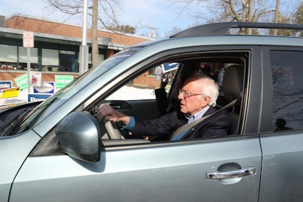 Democratic Presidential candidate and Vermont Senator Bernie Sanders and his wife Jane drive away af...