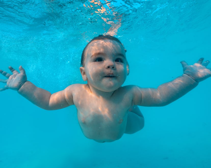 Beautiful Baby infant in sea, Pisces baby