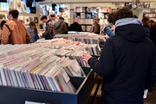 Vinyl record enthusiasts queue up for Record Store Day in Soho, London.