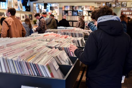 Vinyl record enthusiasts queue up for Record Store Day in Soho, London.