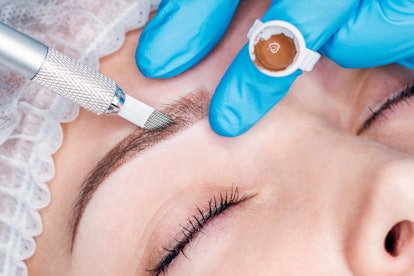 closeup of woman getting microblading treatment 