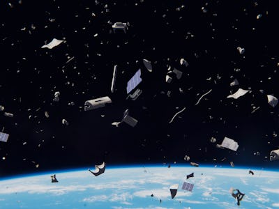 space debris in Earth orbit, dangerous junk orbiting around the blue planet (3d illustration, elemen...