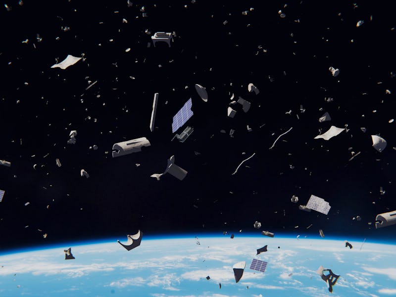 space debris in Earth orbit, dangerous junk orbiting around the blue planet (3d illustration, elemen...