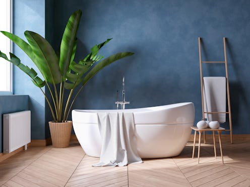 Luxurious Modern Bathroom interior design,white bathtub on grunge dark blue wall,3d render