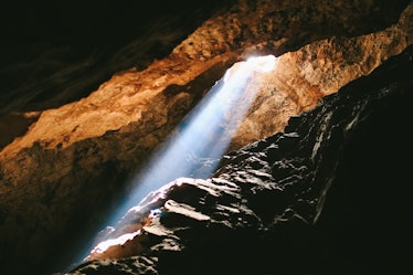 Light inside the Sterkfontein Caves in the  paleoanthropological site Cradle of Humankind in Johanne...