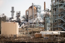 Fumes spread out of the Tesoro Corp. oil refinery of Long Beach in Los Angeles, California, 23 Augus...