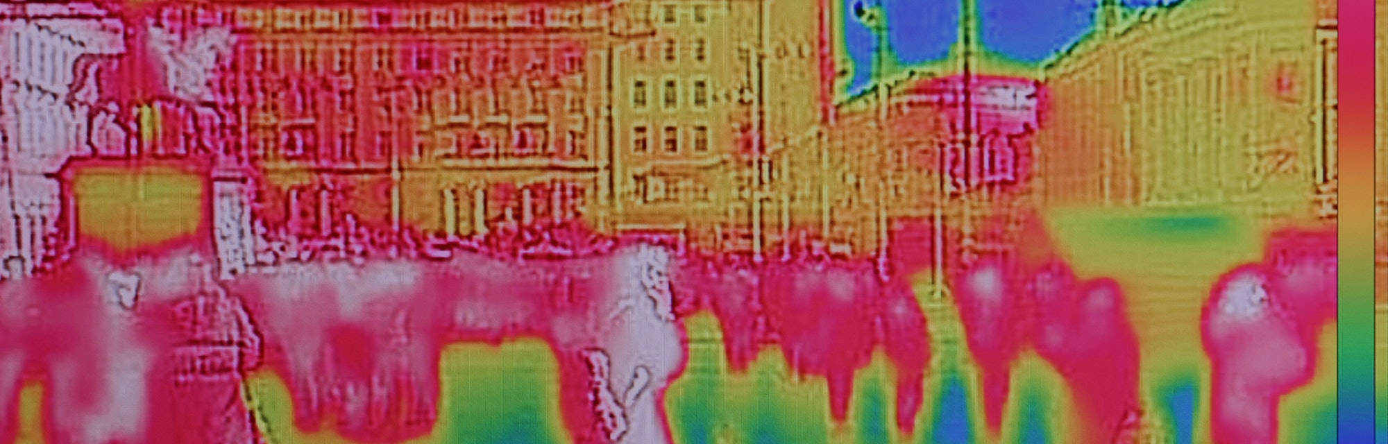 Infrared Thermal image of people walking the city streets, on a cold winter day