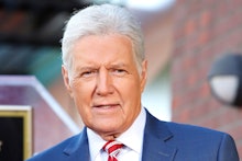 US game show host Alex Trebek attends a ceremony honoring US game show producer Harry Friedman (unse...