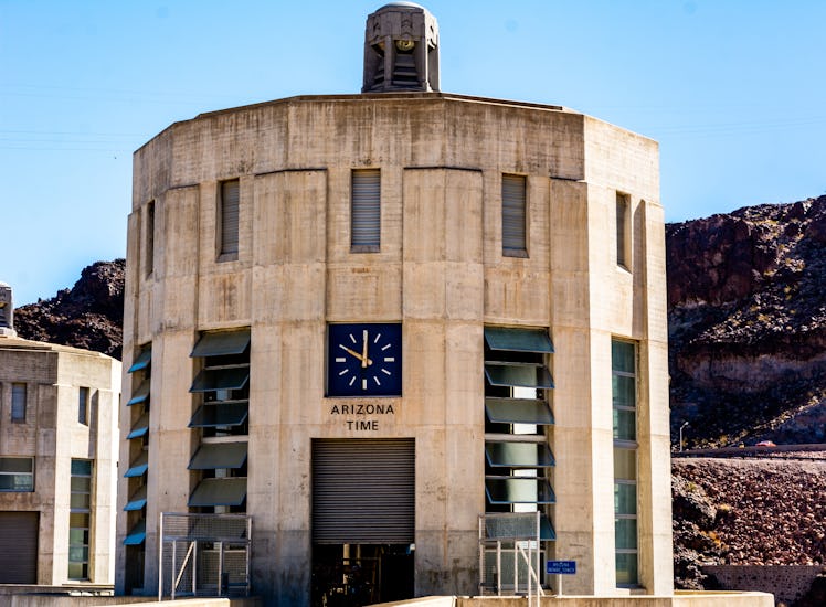 Hoover Dam, border of Arizona & Nevada. Hoover Dams Arizona clock on intake tower. 