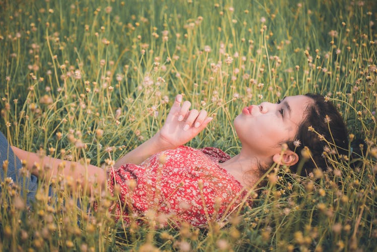 Girl with a flower field.