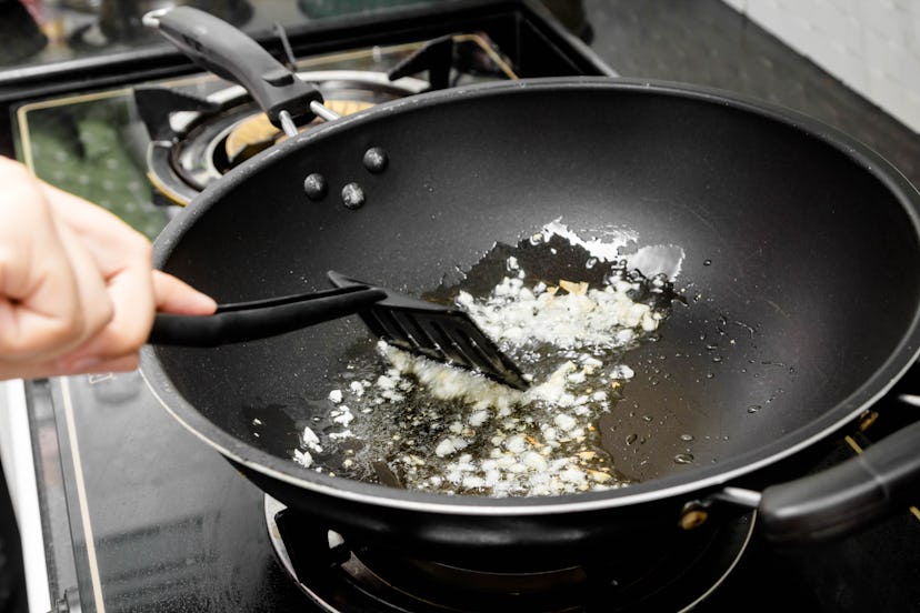 Saute garlic in a frying pan.