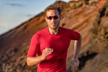 Athlete runner trail running in mountains nature. Sport active fitness ultra trail, run marathoner t...