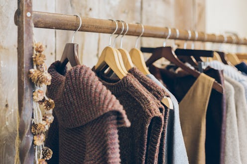 Fashion trend concept. Warm winter ladies clothes collection with wool dresses and knitted jumpers o...