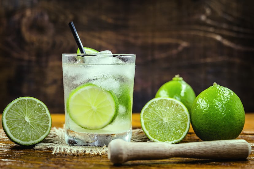 Brazilian Caipirinha, typical Brazilian cocktail made with lemon, cachaça and sugar. Traditional bra...