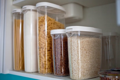 Storing food in air tight plastic containers helps with pantry organization.