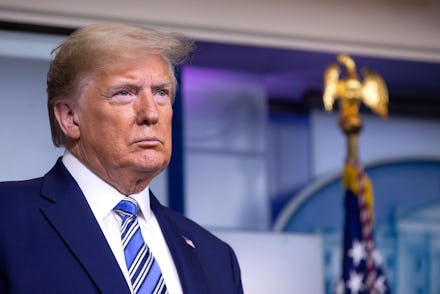 United States President Donald J. Trump listens as United States Vice President Mike Pence delivers ...