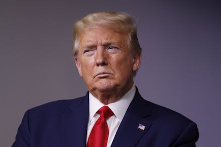 United States President Donald J. Trump listens during a news conference at the White House in Washi...