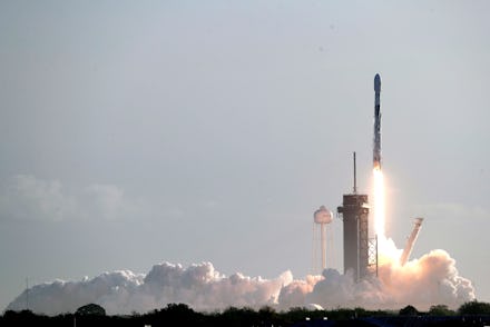 Falcon 9 SpaceX rocket with a payload of approximately 60 satellites for SpaceX's Starlink broadband...