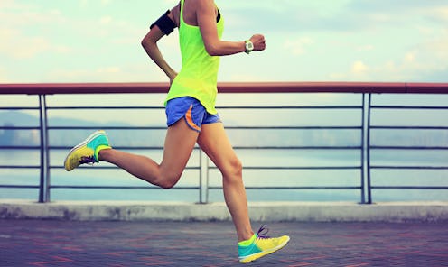 healthy lifestyle young fitness woman running at seaside