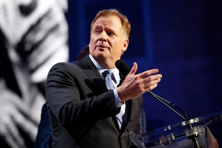 NFL Commissioner Roger Goodell addresses the crowd during the first round at the NFL football draft,...