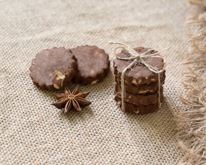 chocolate cookies with anise on burlap