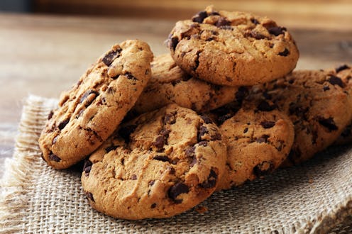 Chocolate cookies on wooden table.