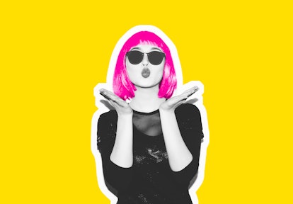 Insanely crazy fashion hipster girl in a hot pink wig. Dangerous rock party is boring, a woman ironi...