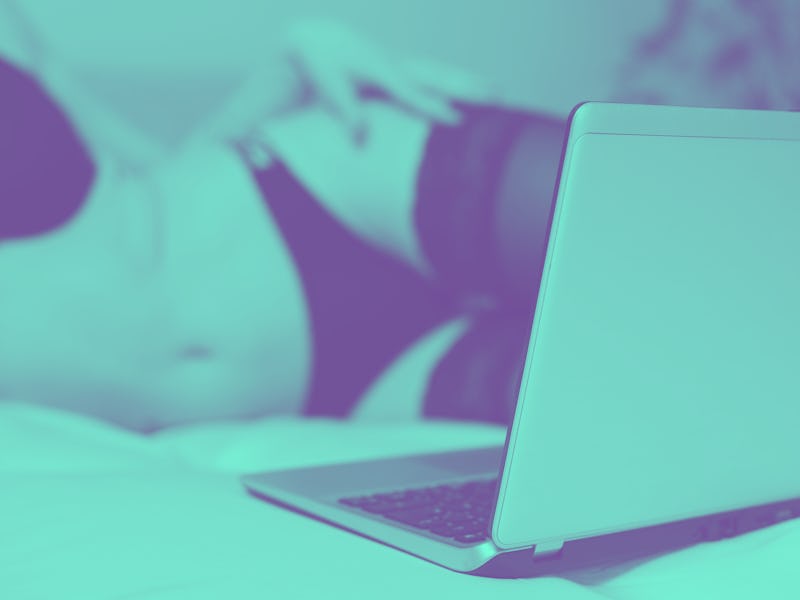 Seductive woman working on as webcam model. Virtual sex.