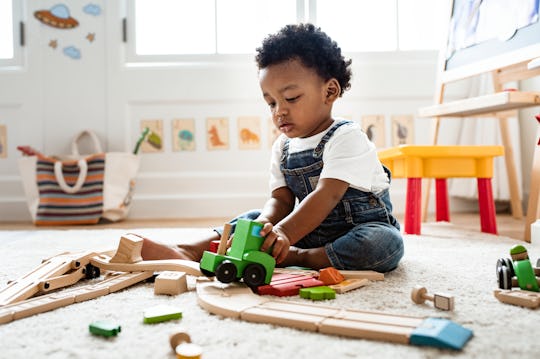 When Do Babies Really Start Playing With Toys An Expert Explains