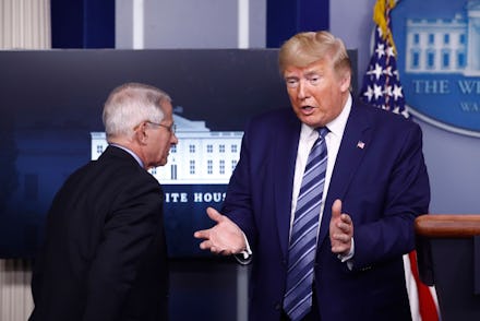 President Donald Trump speaks as Dr. Anthony Fauci, director of the National Institute of Allergy an...