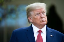 United States President Donald Trump listens during a news conference on the COVID-19 pandemic in th...