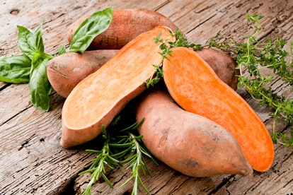 Sweet potato on Wooden background 