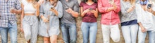 Group of teenager friends using mobile smartphone - People having fun with technology trends - Youth...