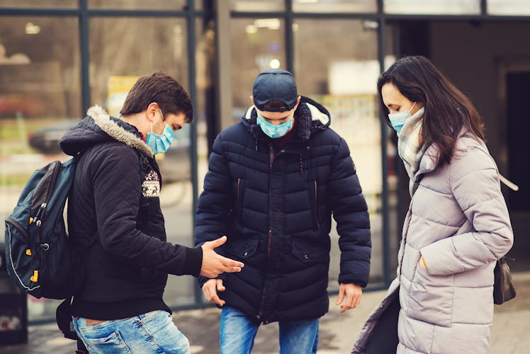 Global pandemic. Coronavirus disease. People in a medical mask outdoors. Coronavirus epidemic. Non-c...