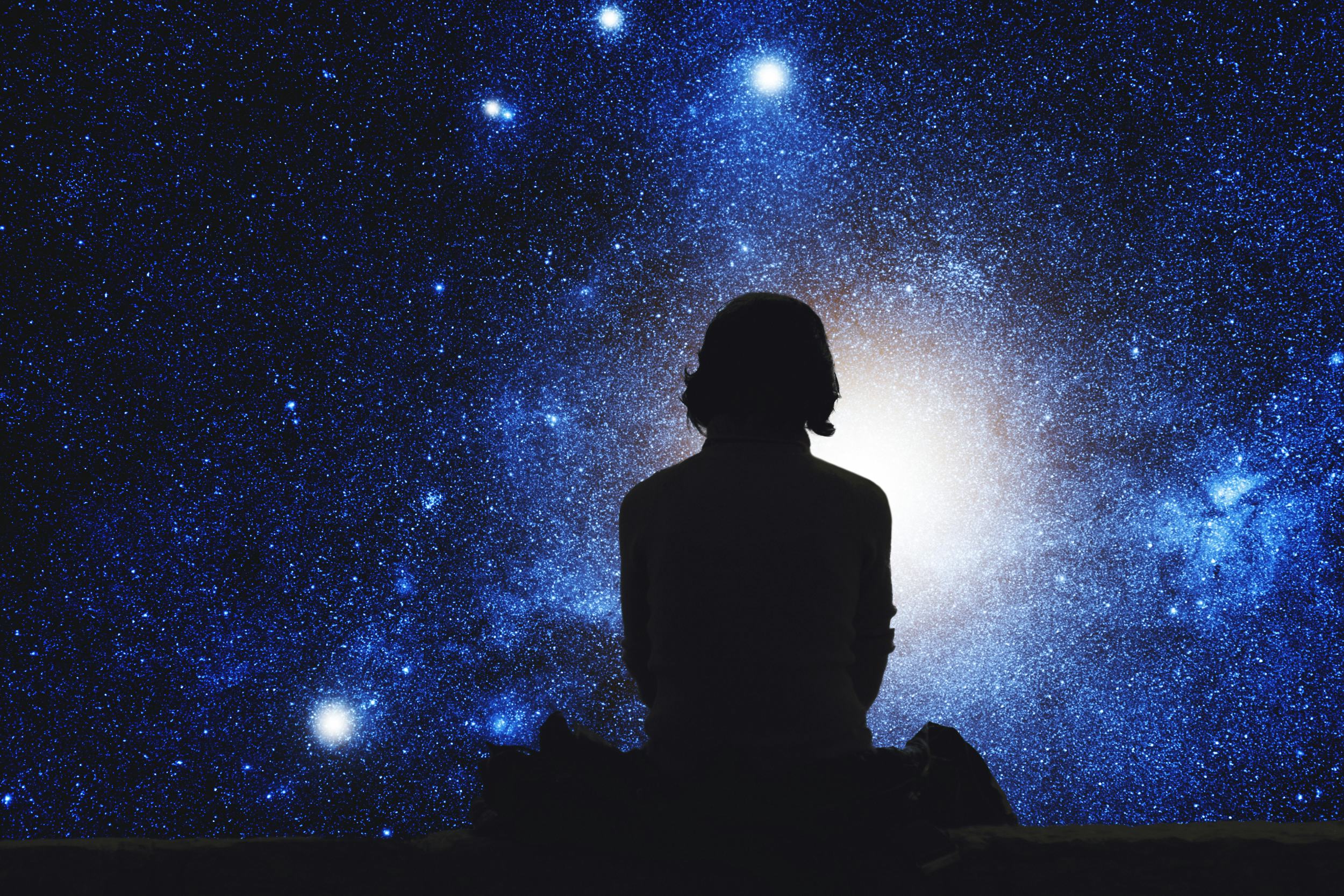 Girl watching the space. Stars are digital illustration.