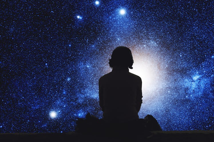 Girl watching the space. Stars are digital illustration.
