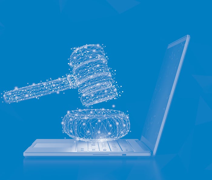 Internet law concept with 3d rendering computer notebook display gavel judge
