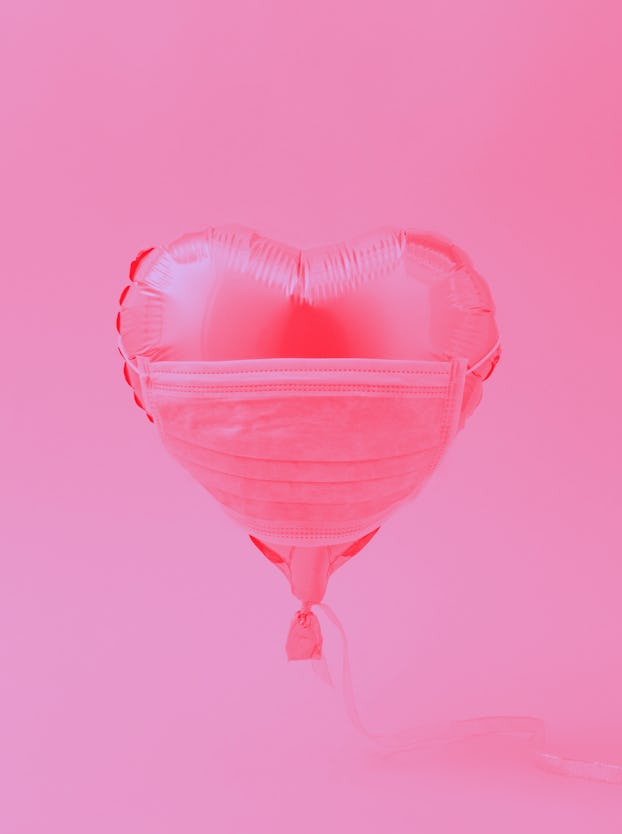 Pink balloon heart with face protective mask. COVID-19 concept. new Corona virus infection(novel cor...