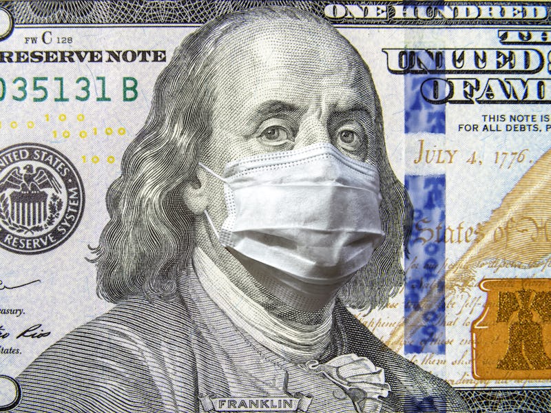 COVID-19 coronavirus in USA, 100 dollar money bill with face mask. Coronavirus affects global stock ...