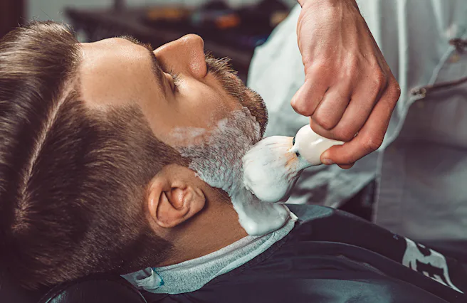 Hipster client visiting barber shop