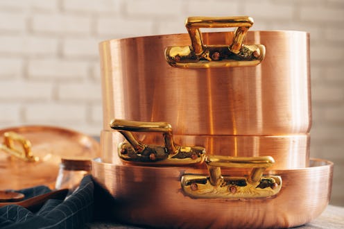 New copper cookware for professional kitchen close up