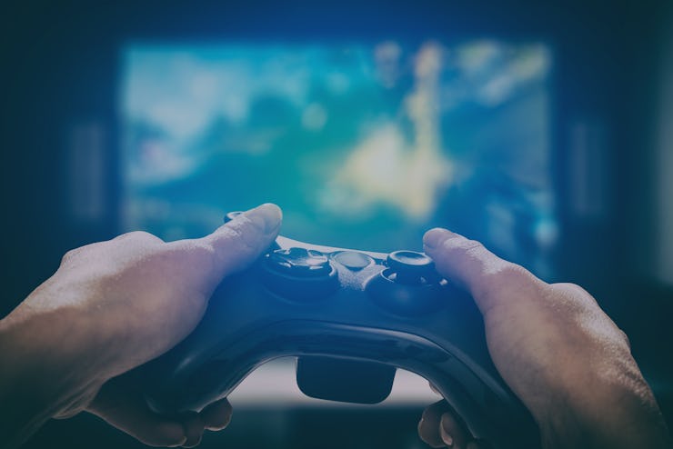 gaming game play tv fun gamer gamepad guy controller video console playing player holding hobby play...