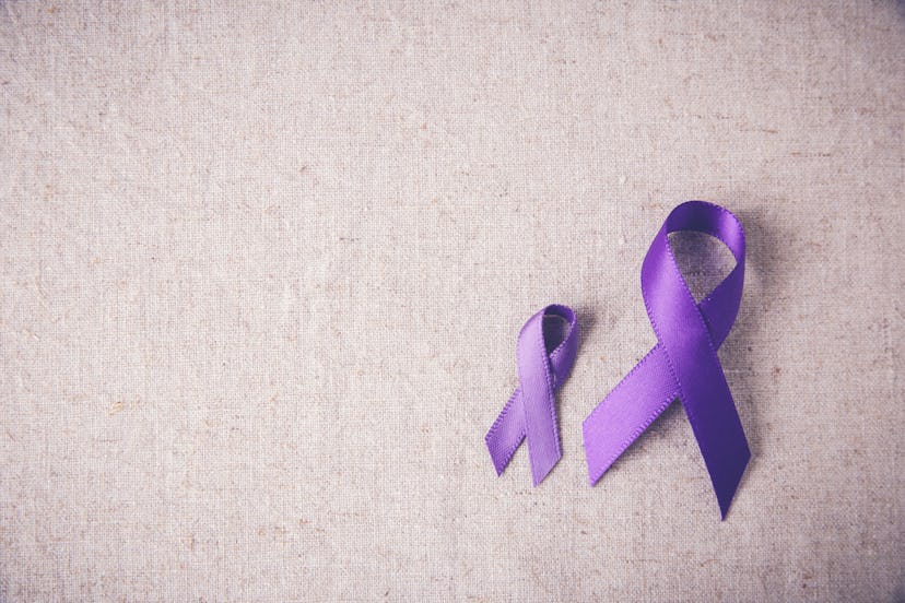 Purple ribbons toning copy space background, Alzheimer's disease, Pancreatic cancer, Epilepsy awaren...