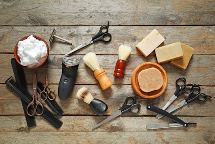 Set for male shaving on wooden background