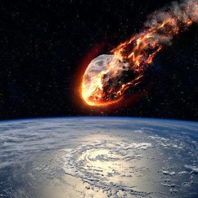 A Meteor glowing as it enters the Earth's atmosphere. Elements of this image furnished by NASA