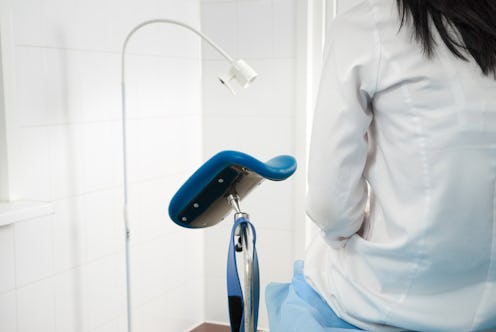 Woman at gynecologist office sitting and waiting for a doctor with test results