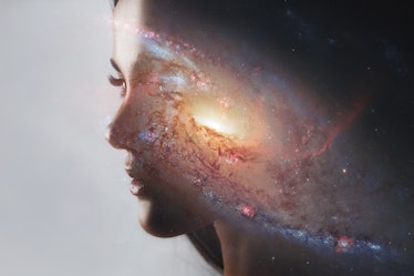 The universe inside us, the profile of a young woman and space, the effect of double exposure. scien...