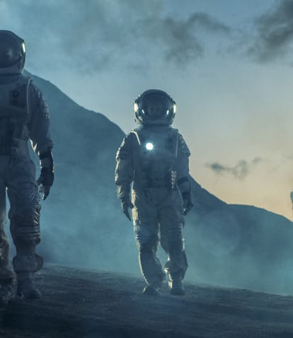 Two Astronauts in Space Suits Confidently Walking on Alien Planet, Exploration of the the Planet's S...