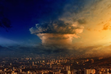 Mushroom cloud look like nuclear bomb explosion over big town