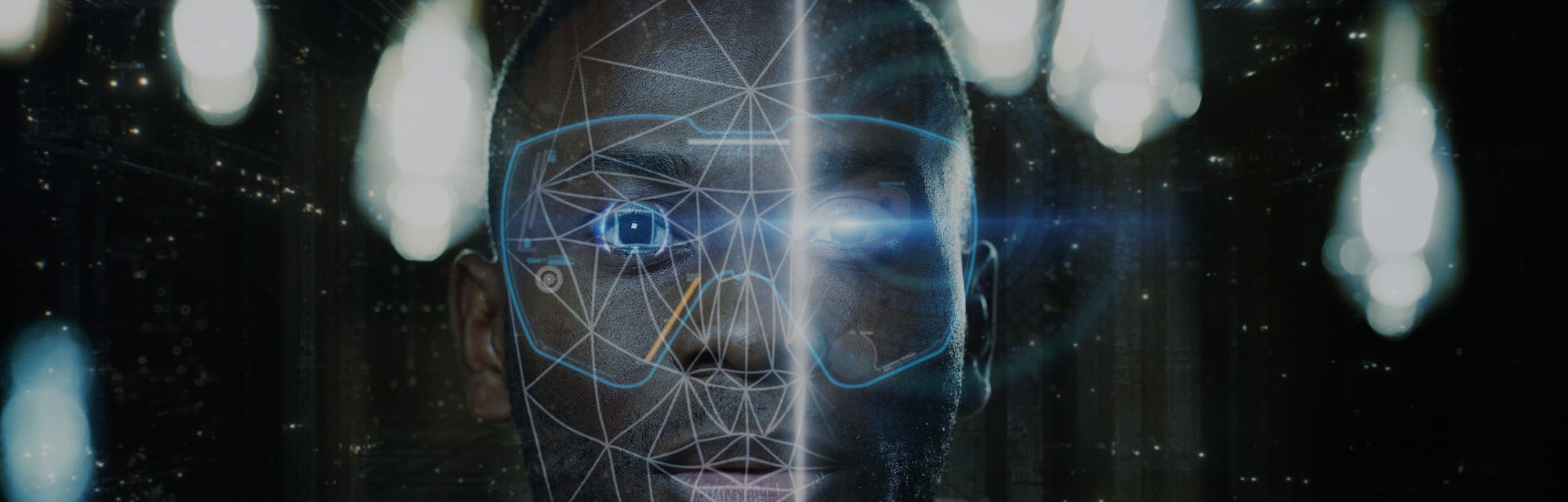 Futuristic and technological scanning of the face of a young african man for facial recognition and ...